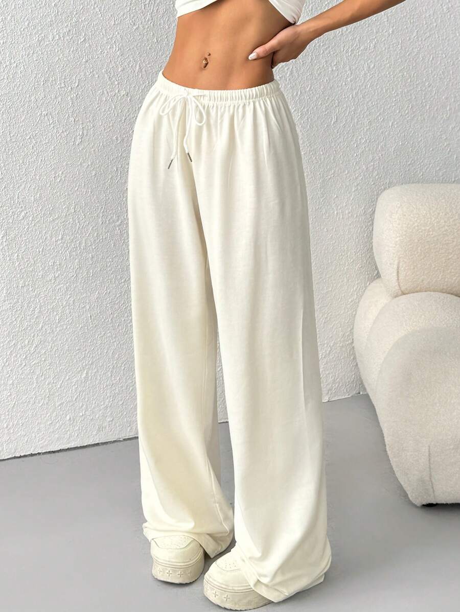 Düz Renk Bağcıklı Bel Düz Paça Jogger Pantolon
