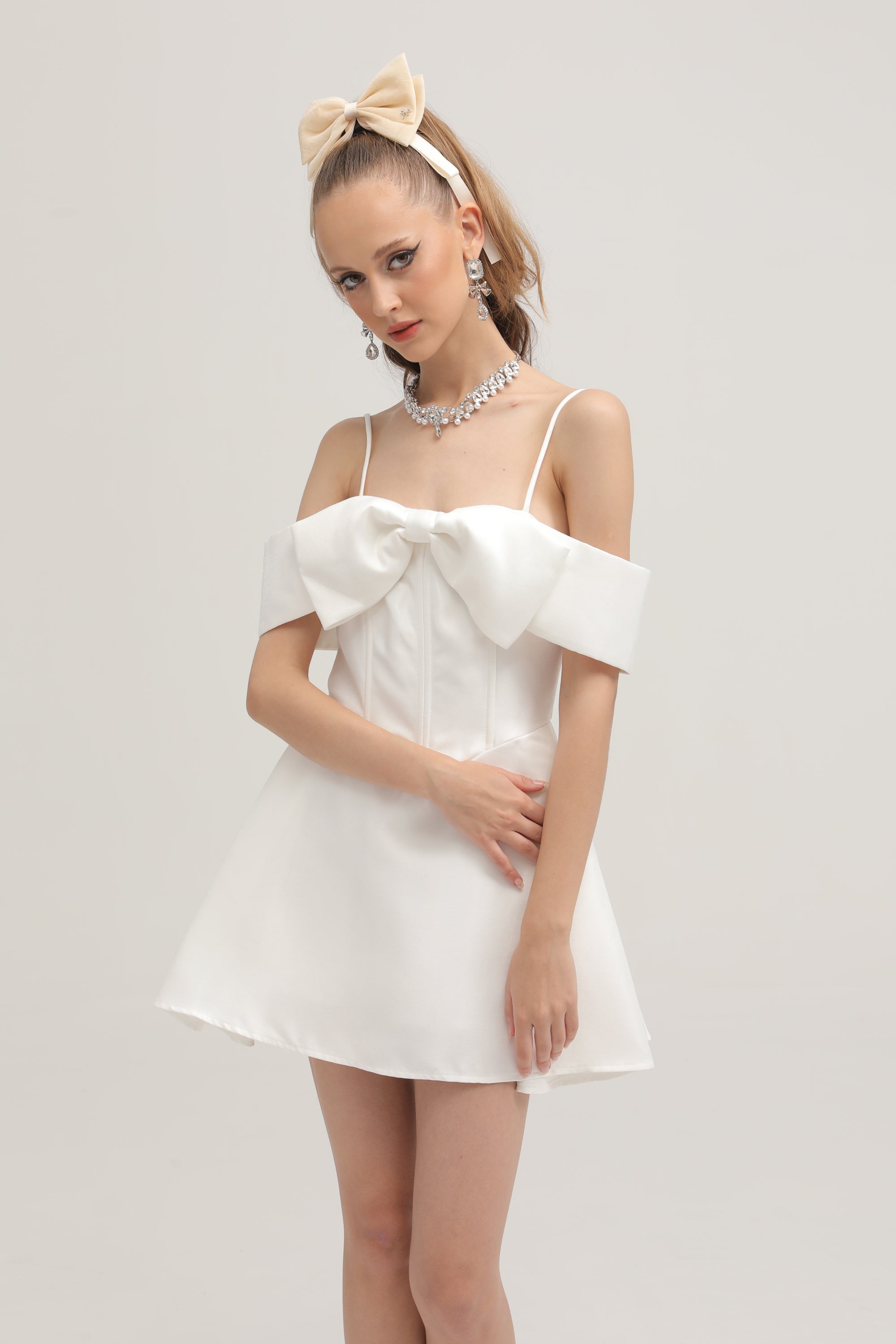 Elva White Flared Mini Dress with Bow