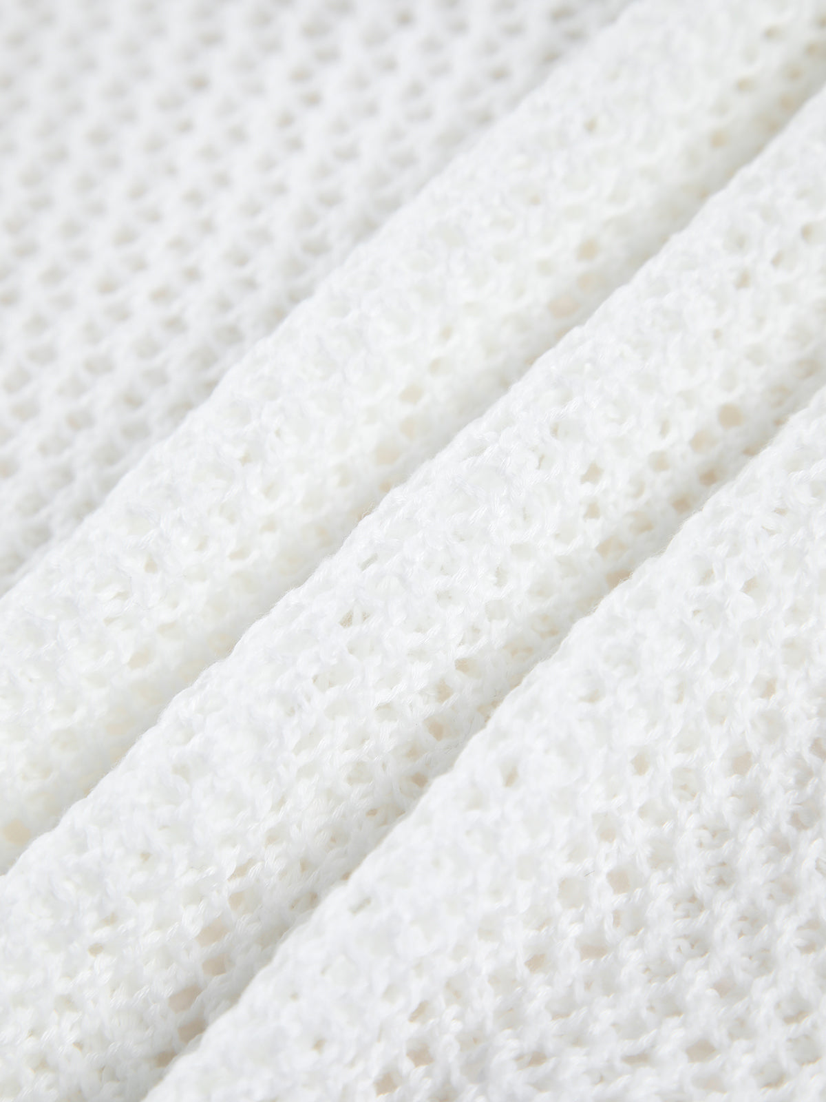 Gehäkelte Strickjacke mit Ösen