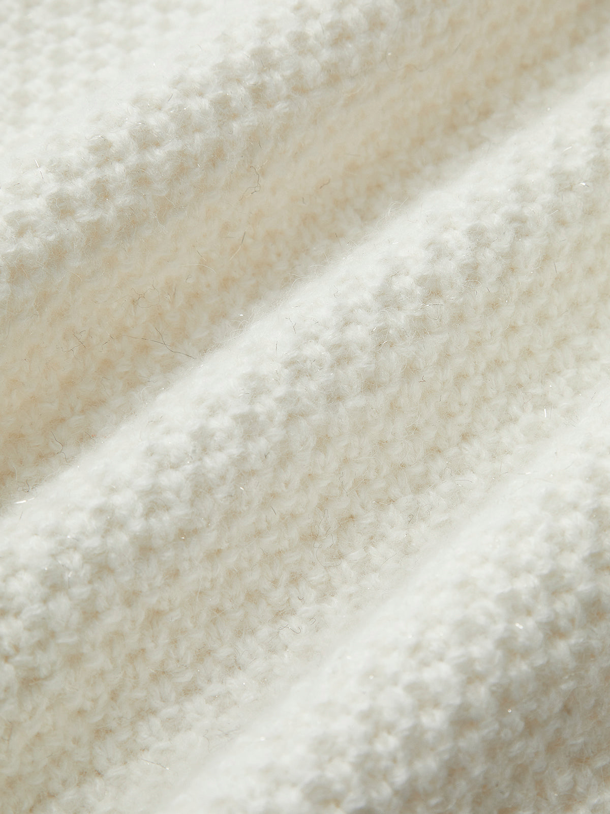 Strickjacke mit kontrastierender Bordüre und floraler Verzierung
