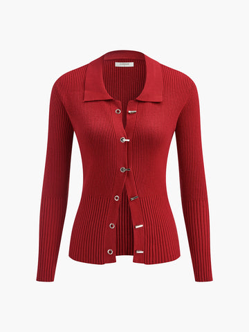 Polo-Strickjacke mit Rippenmuster und Metalldesign