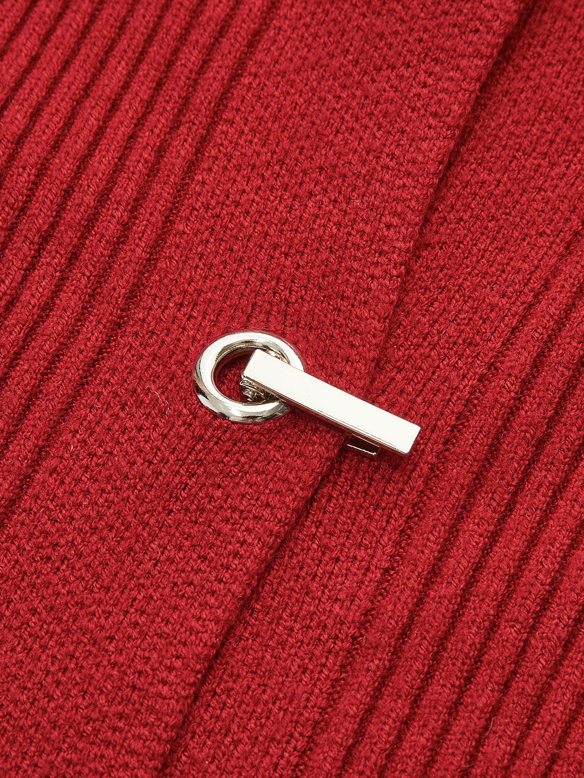 Polo-Strickjacke mit Rippenmuster und Metalldesign