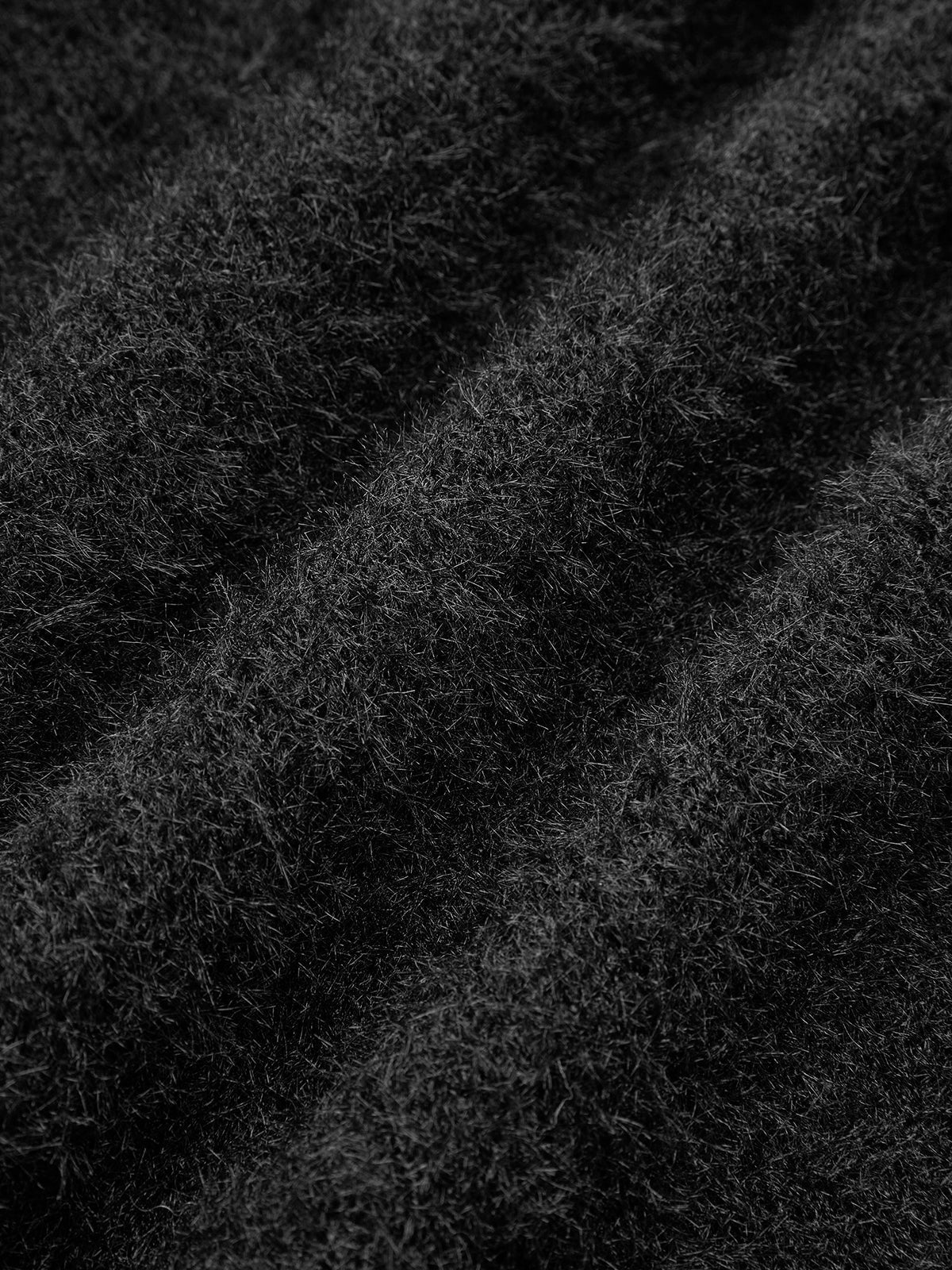 Perlenbesetzter Strickpullover mit Schleifendetail