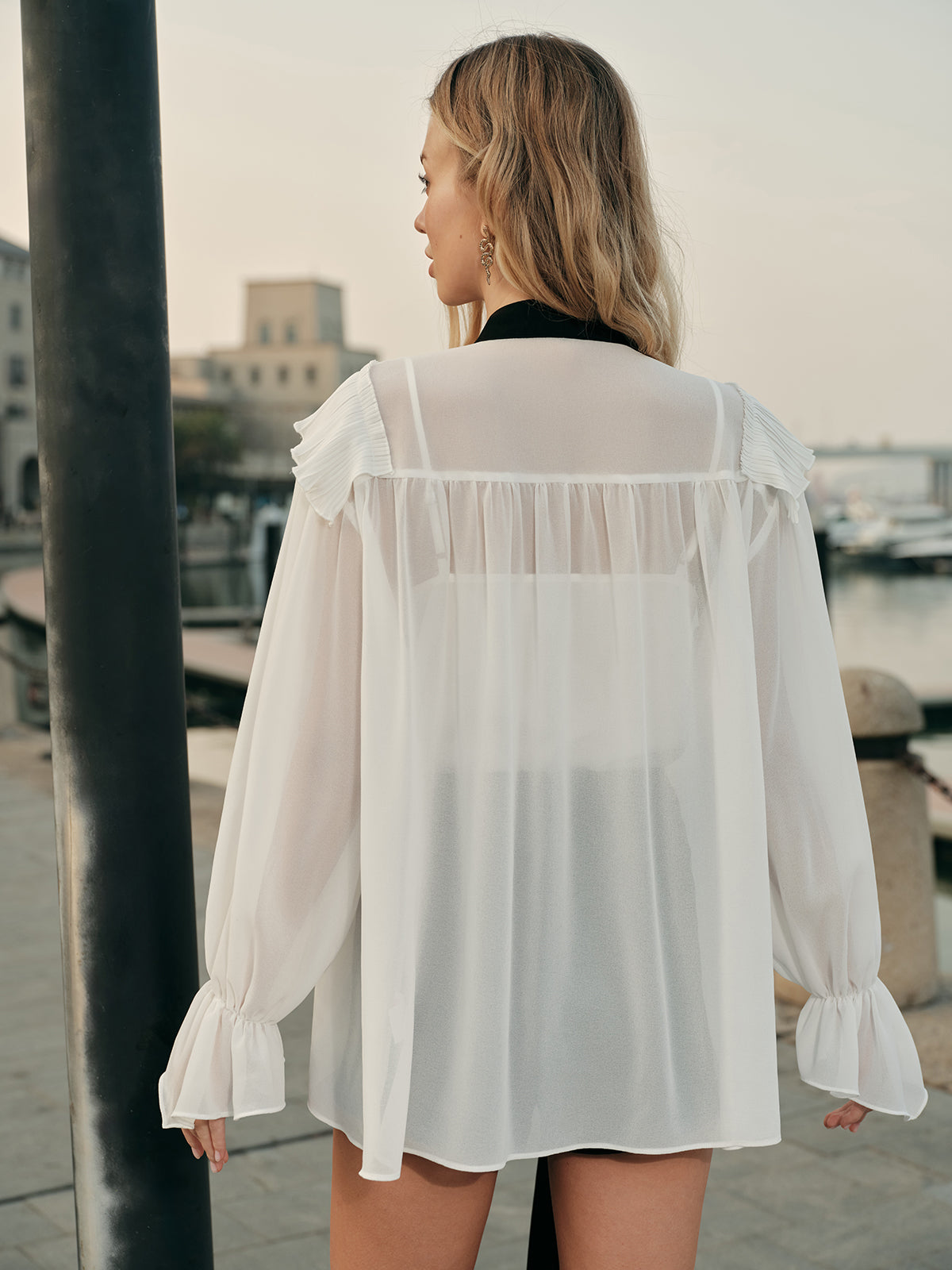Semi-Sheer Blouse with Contrasting Tie and Ruffled Details