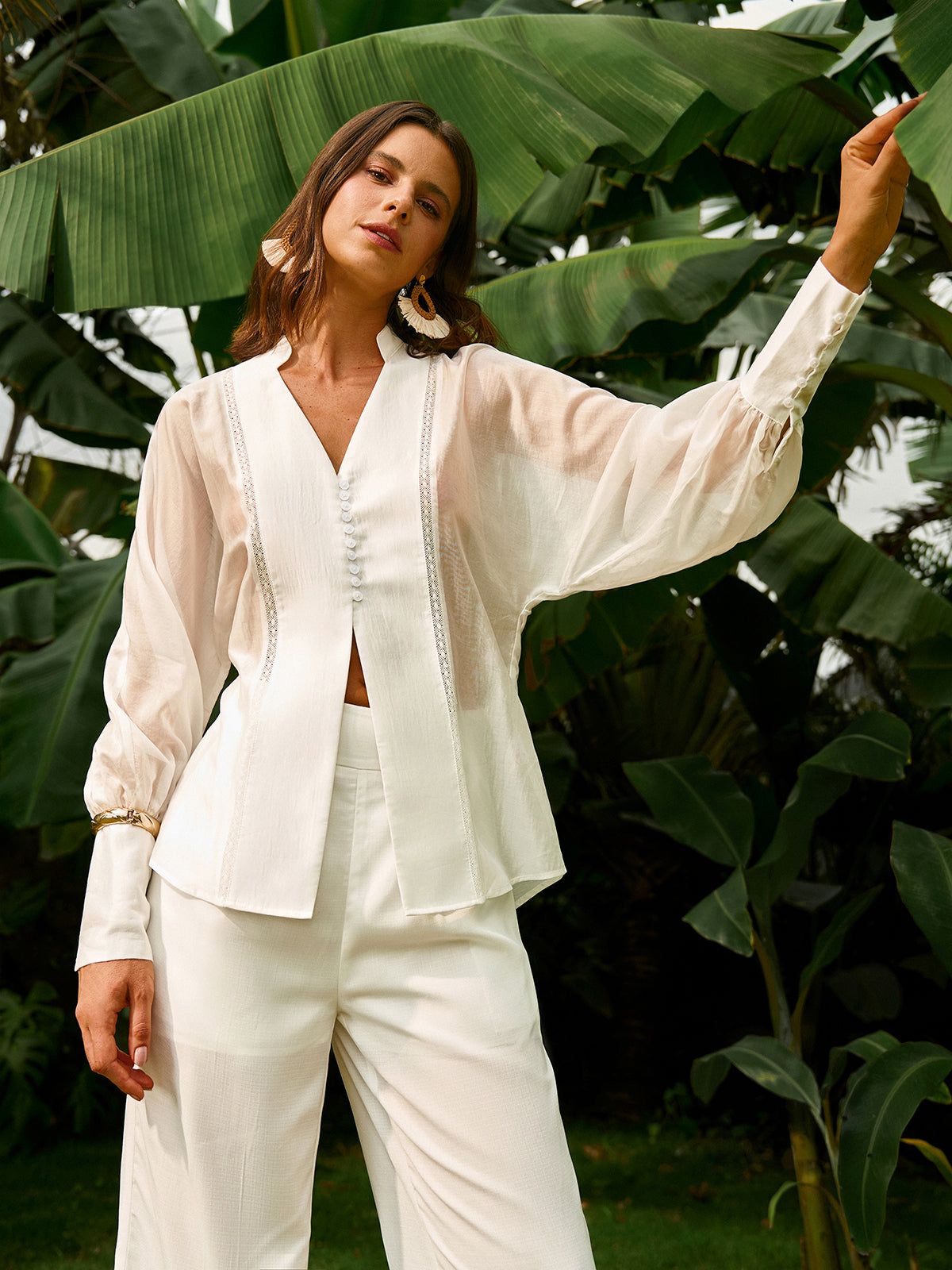 Transparente Bluse mit Puffärmeln