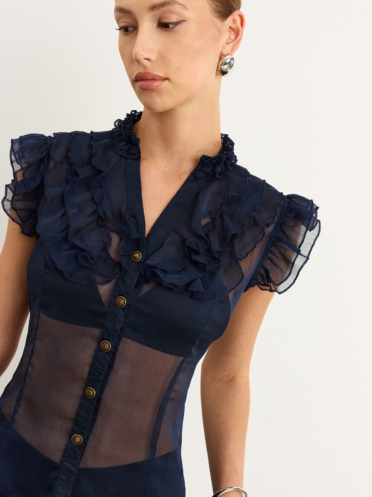 Halbtransparente Rüschenbluse