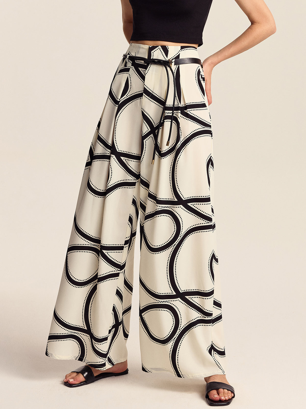 Halbtransparente, gemusterte Hose mit weitem Bein