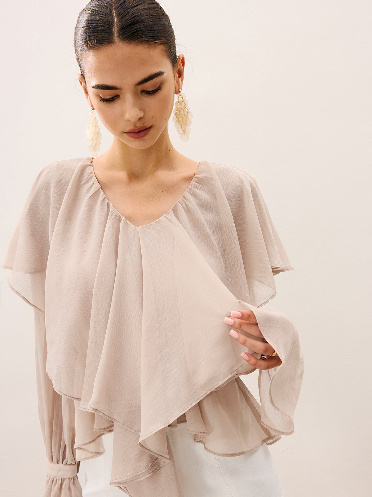 Halbtransparente, gerüschte Lagenbluse aus Chiffon