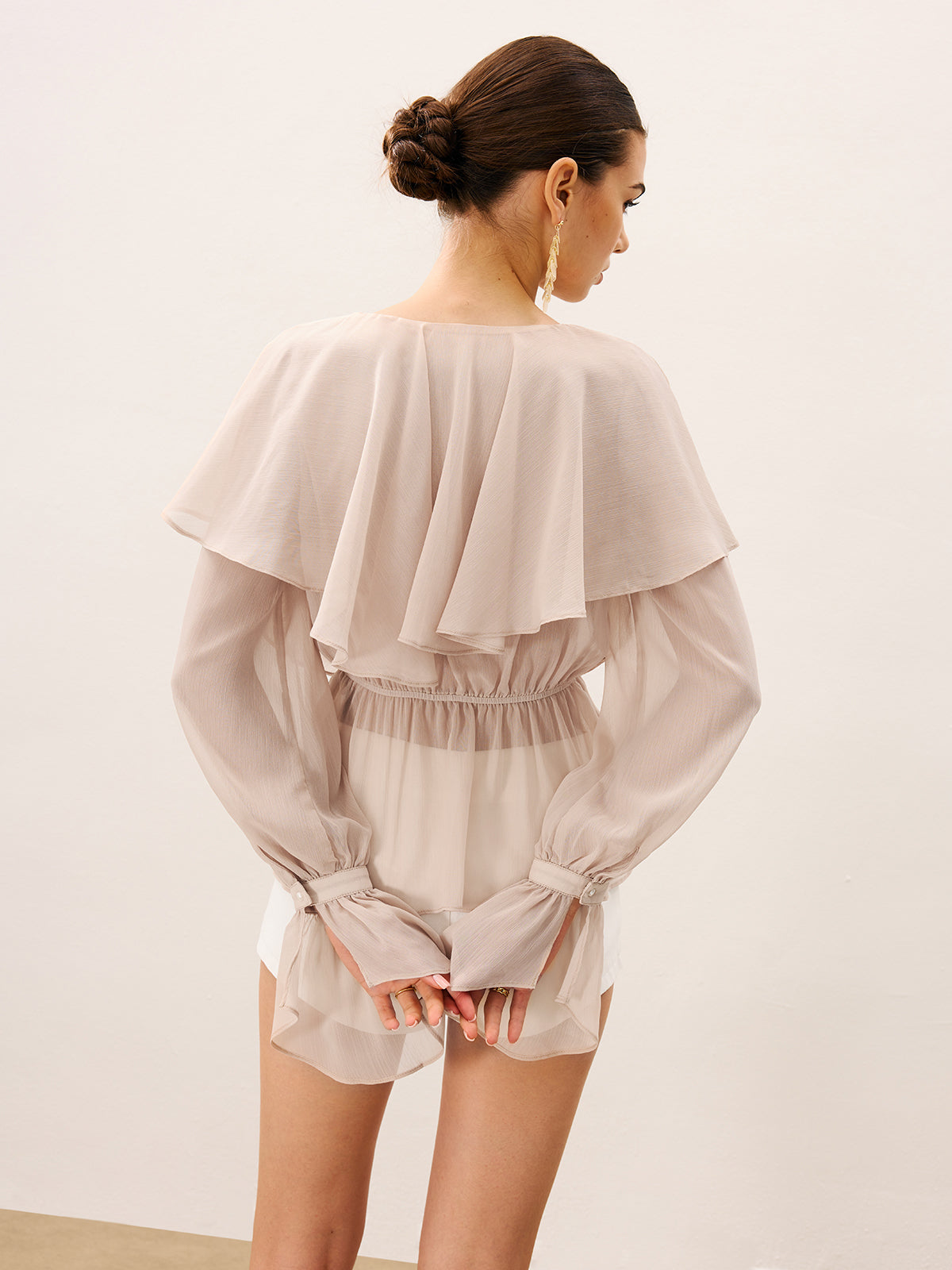 Halbtransparente, gerüschte Lagenbluse aus Chiffon