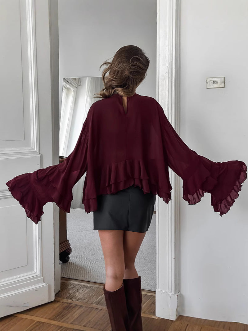 Transparente Chiffonbluse mit Rollkragen und Rüschen