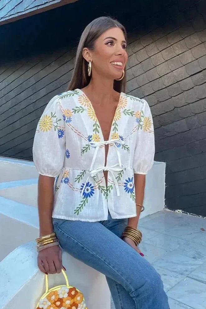 Bluse mit floralem Schleifen-Peplum