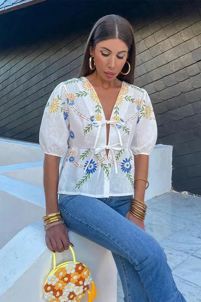 Bluse mit floralem Schleifen-Peplum