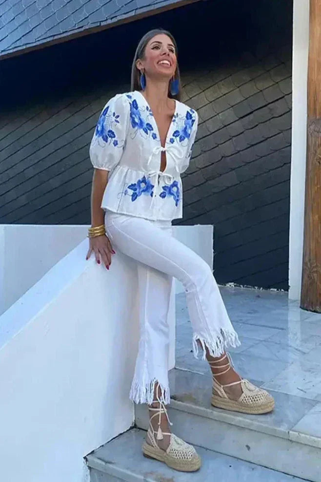 Bluse mit floralem Schleifen-Peplum