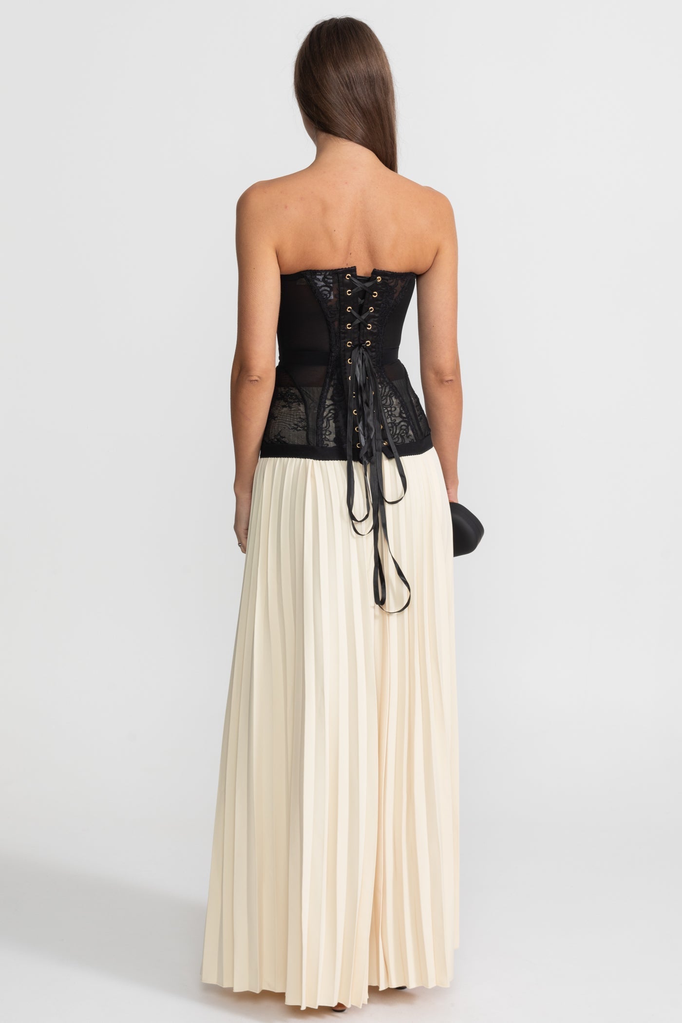 Trägerloses Spitzenkorsett-Top mit Faltenrock und Vorderverschluss